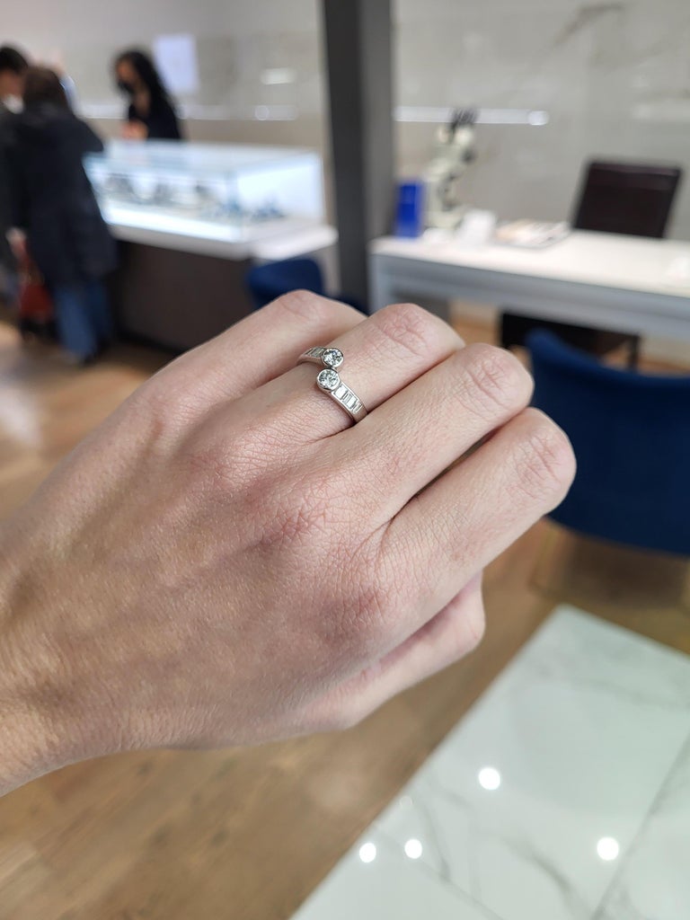 14 Karat White Gold Bezel Set Diamond Bypass Ring For Sale at 1stDibs