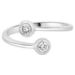 Used 14 Karat White Gold Bezel Set Diamond Bypass Ring