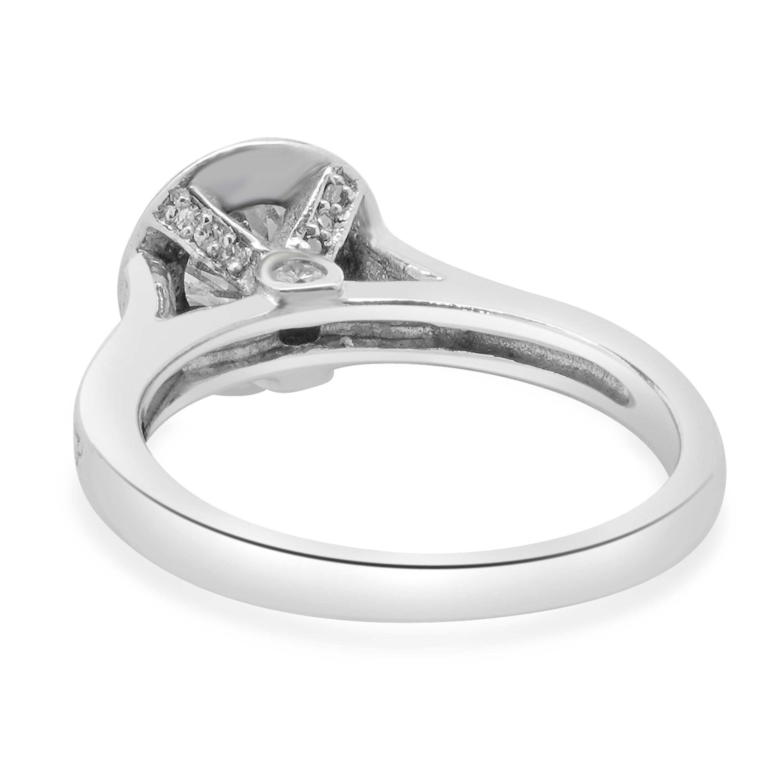 Round Cut 14 Karat White Gold Bezel Set Diamond Engagement Ring For Sale