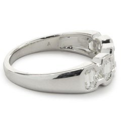 18 Karat White Gold Bezel Set Emerald Cut Diamond Band