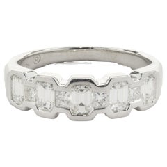 18 Karat White Gold Bezel Set Emerald Cut Diamond Band