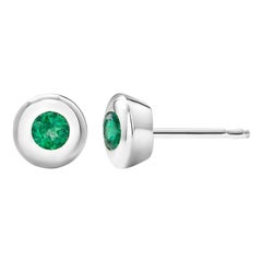 White Gold Bezel Set Emerald 0.30 Carat Stud Earrings Weighing 0.30 Carat