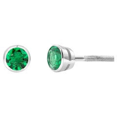 14 Karat White Gold Bezel-Set Pair Round Emerald 0.70 Carat Screw Back Earrings