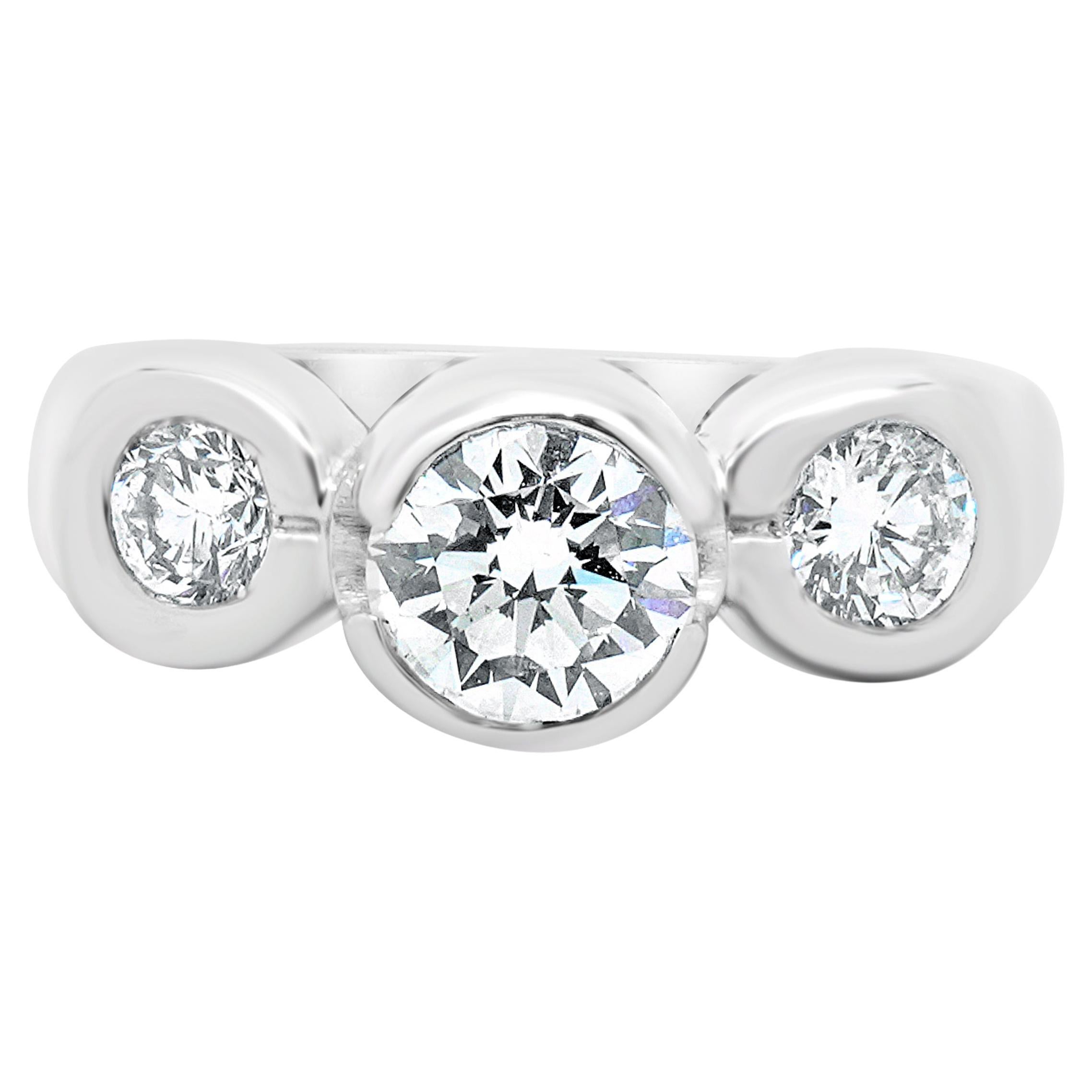 14 Karat White Gold Bezel Set Round Brilliant Cut Three Diamond Engagement Ring