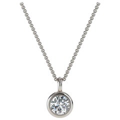 14 Karat White Gold Bezel Solitaire Diamond Pendant 
Center, 1/5 Carat
