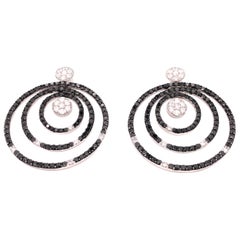 14 Karat White Gold Black and White Diamond Circular Earrings