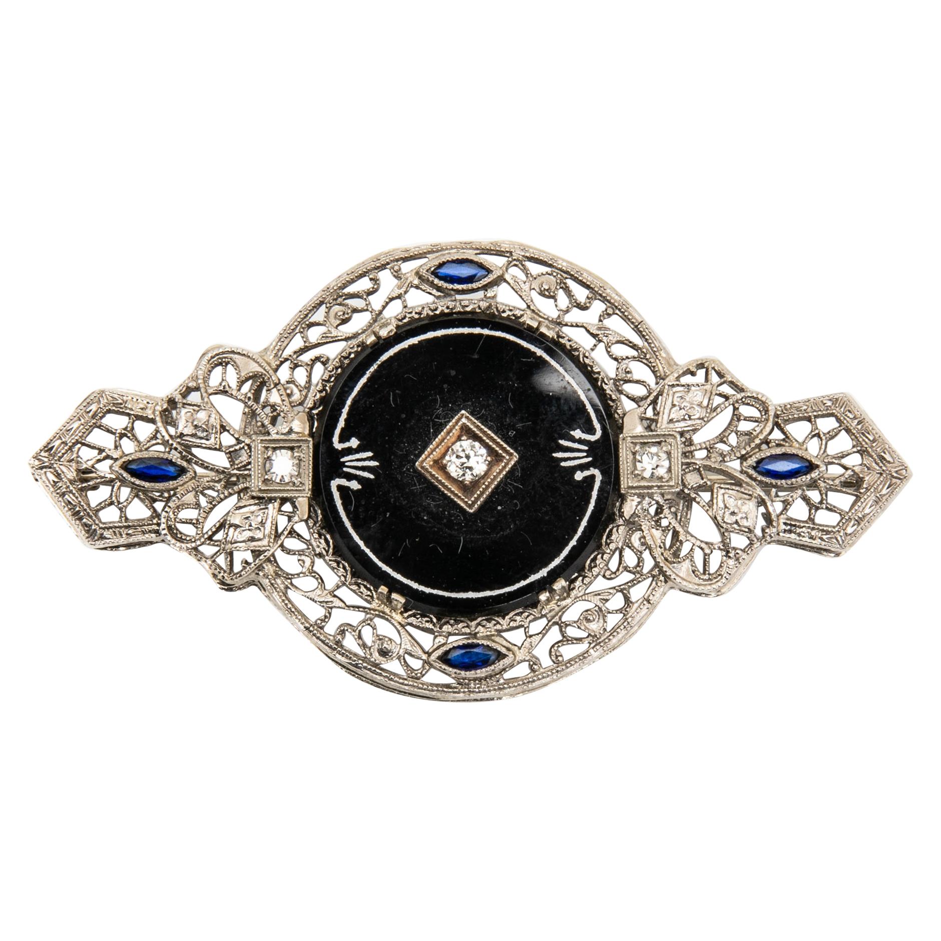 14 Karat White Gold Black Onyx, Diamond and Synthetic Blue Sapphire Brooch