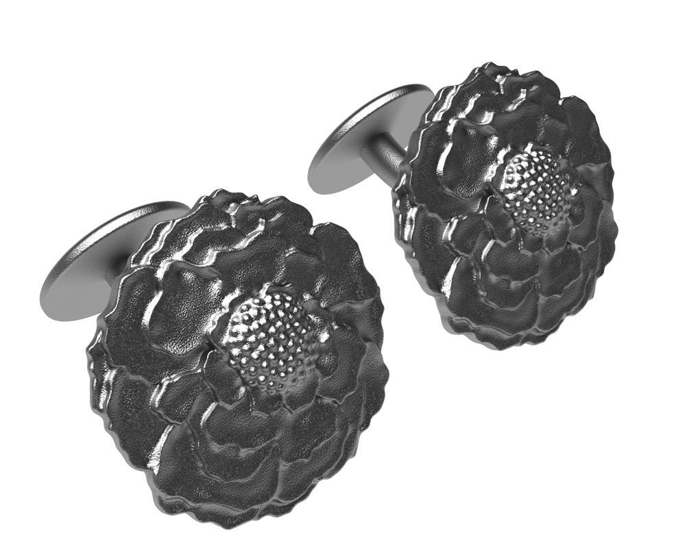 14 Karat White Gold Black Rhodium Marigold Cufflinks. Tiffany designer Thomas Kurilla sculpted these marigolds exclusively for 1stdibs. Beginning with a fabulous flower, the marigold we get a great design for a cufflink. Matte 14k yellow gold. Made