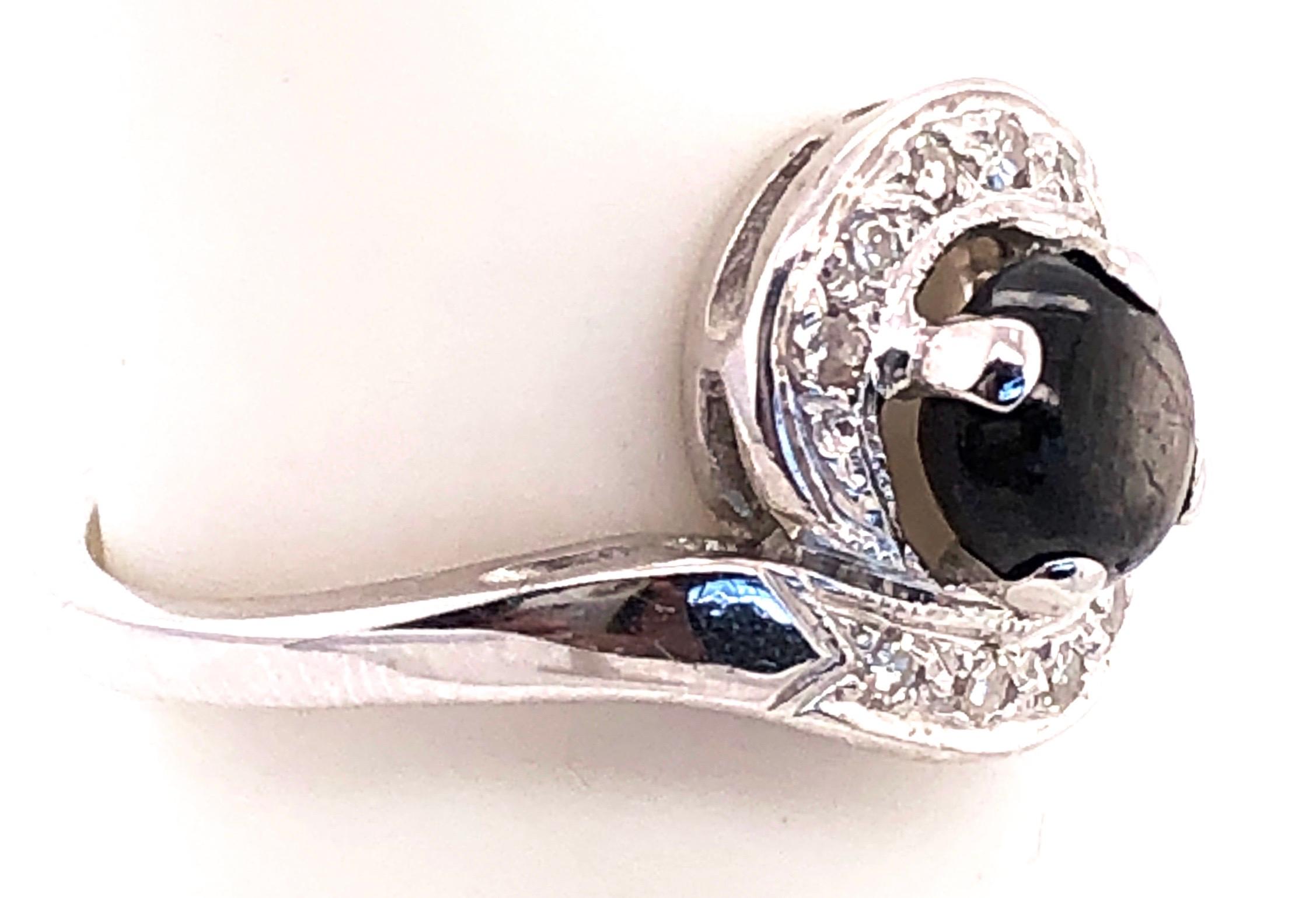 Women's or Men's 14 Karat white Gold Black Sapphire Contemporary Ring with Diamond Accents For Sale