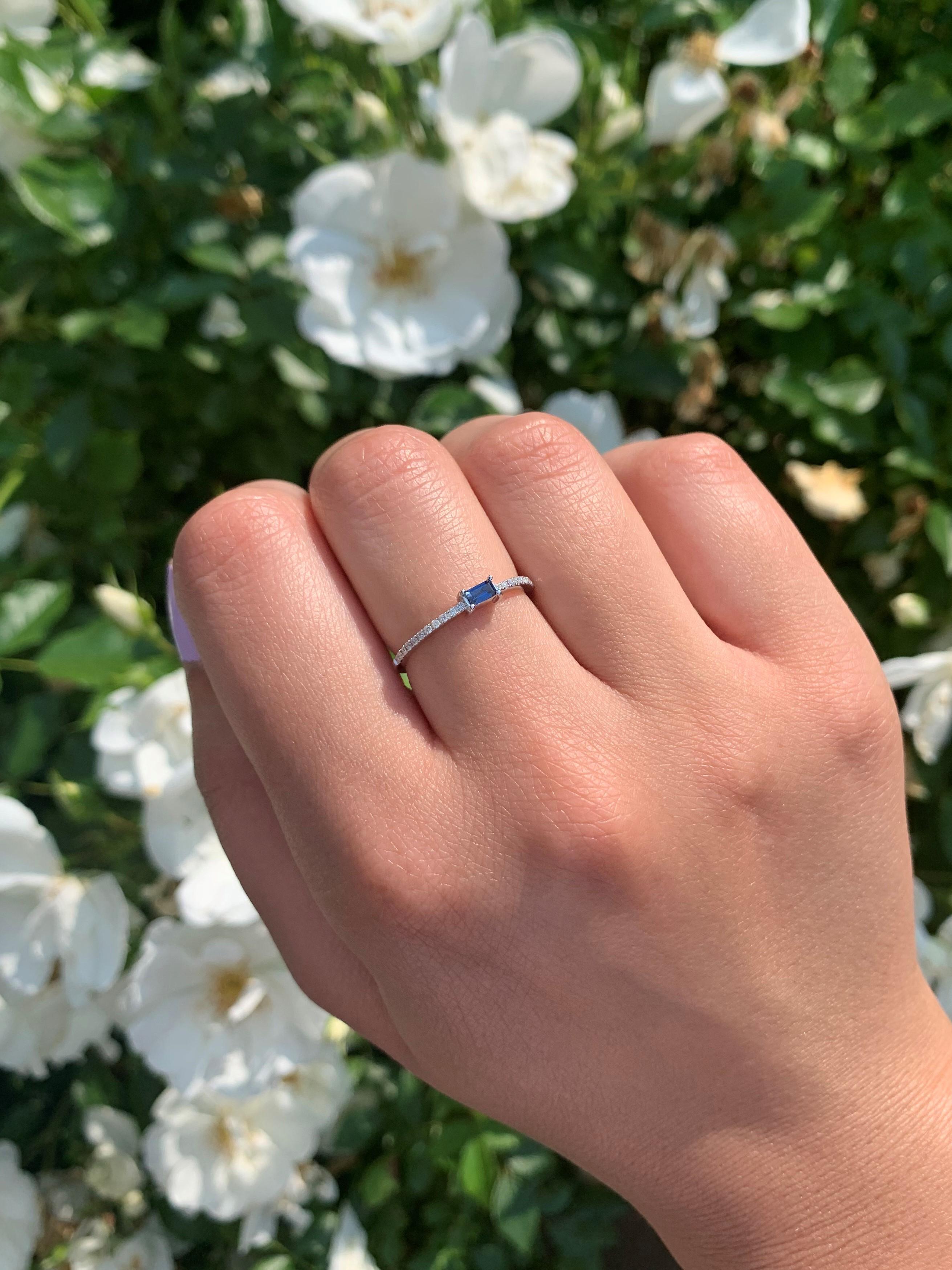 Charming and Elusive Design - This stackable ring features a 14k gold band, a baguette shaped gorgeous blue sapphire approximately 0.14 cts, and round diamonds approximately 0.09 cts, 
Measurements for ring size: The finger Size of the ring is 6.5