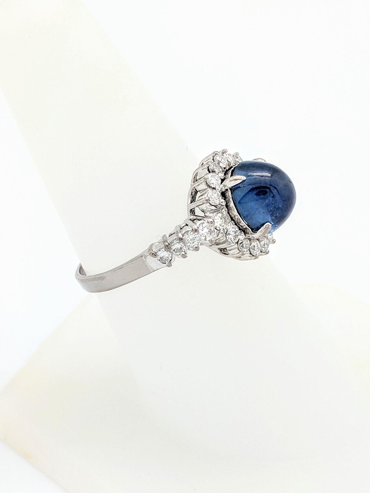 14 Karat White Gold Blue Star Sapphire and Diamond Halo Ring In Excellent Condition In Gainesville, FL