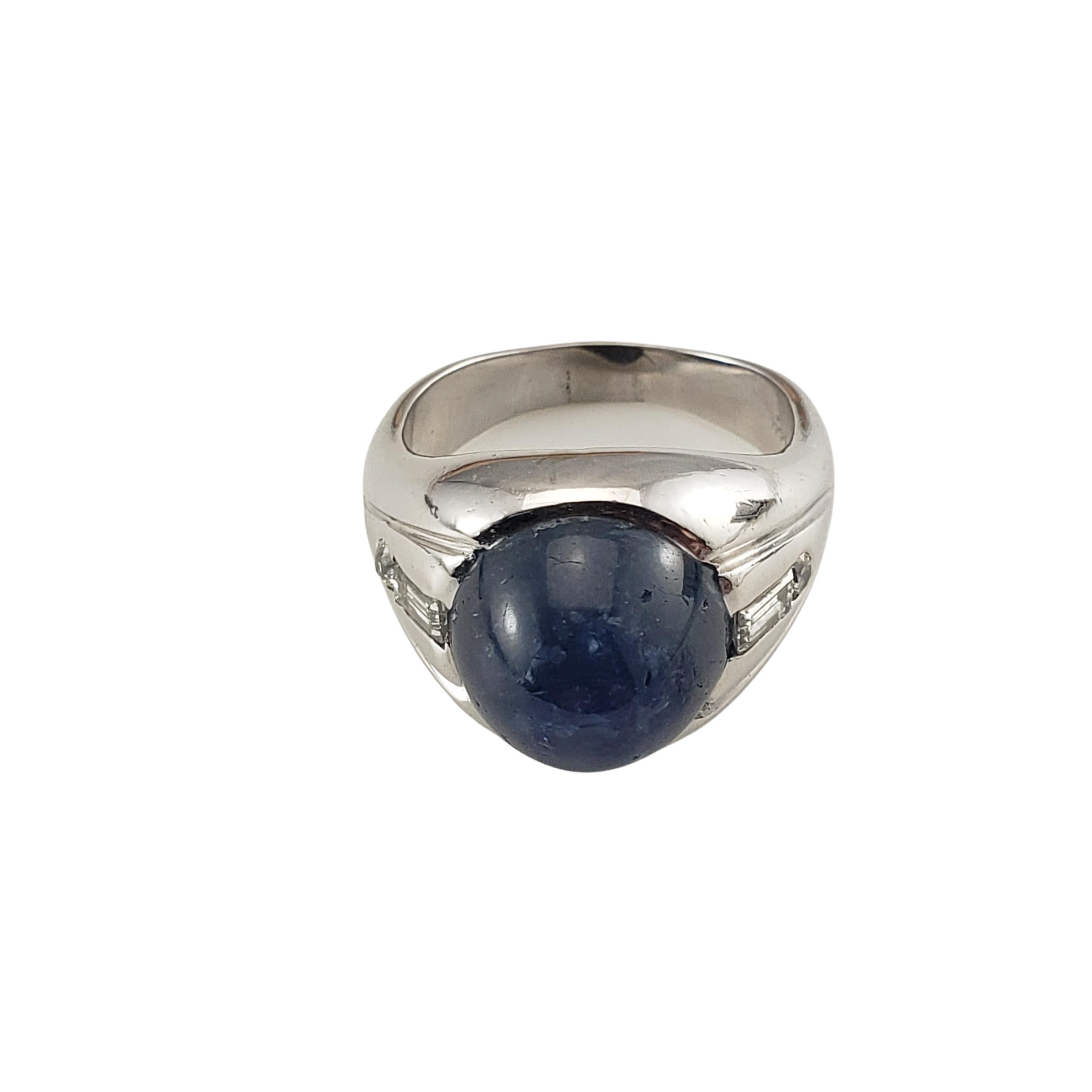 14 Karat White Gold Blue Star Sapphire and Diamond Ring Size 6.75 GAI Certified-

This lovely ring features one star sapphire gemstone, two round brilliant cut diamonds (.04 ct. twt.) and two baguette diamonds* 
(.10 ct. twt.)  set in 14K white