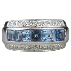 14 Karat White Gold Blue Topaz and Diamond Fashion Ring
