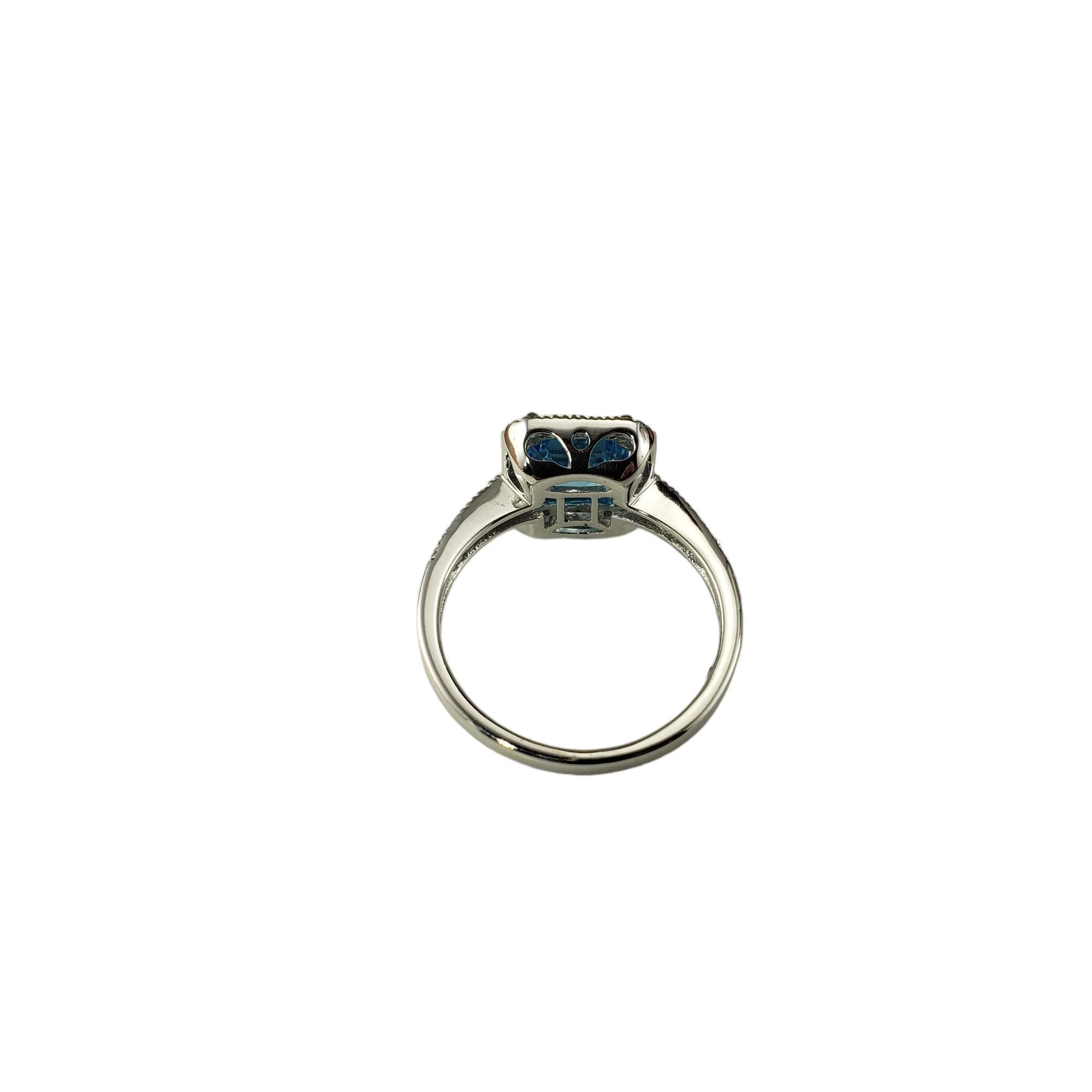 Women's 14 Karat White Gold Blue Topaz and Diamond Halo Ring Size 7 #17867