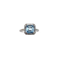 14 Karat White Gold Blue Topaz and Diamond Halo Ring Size 7 #17867