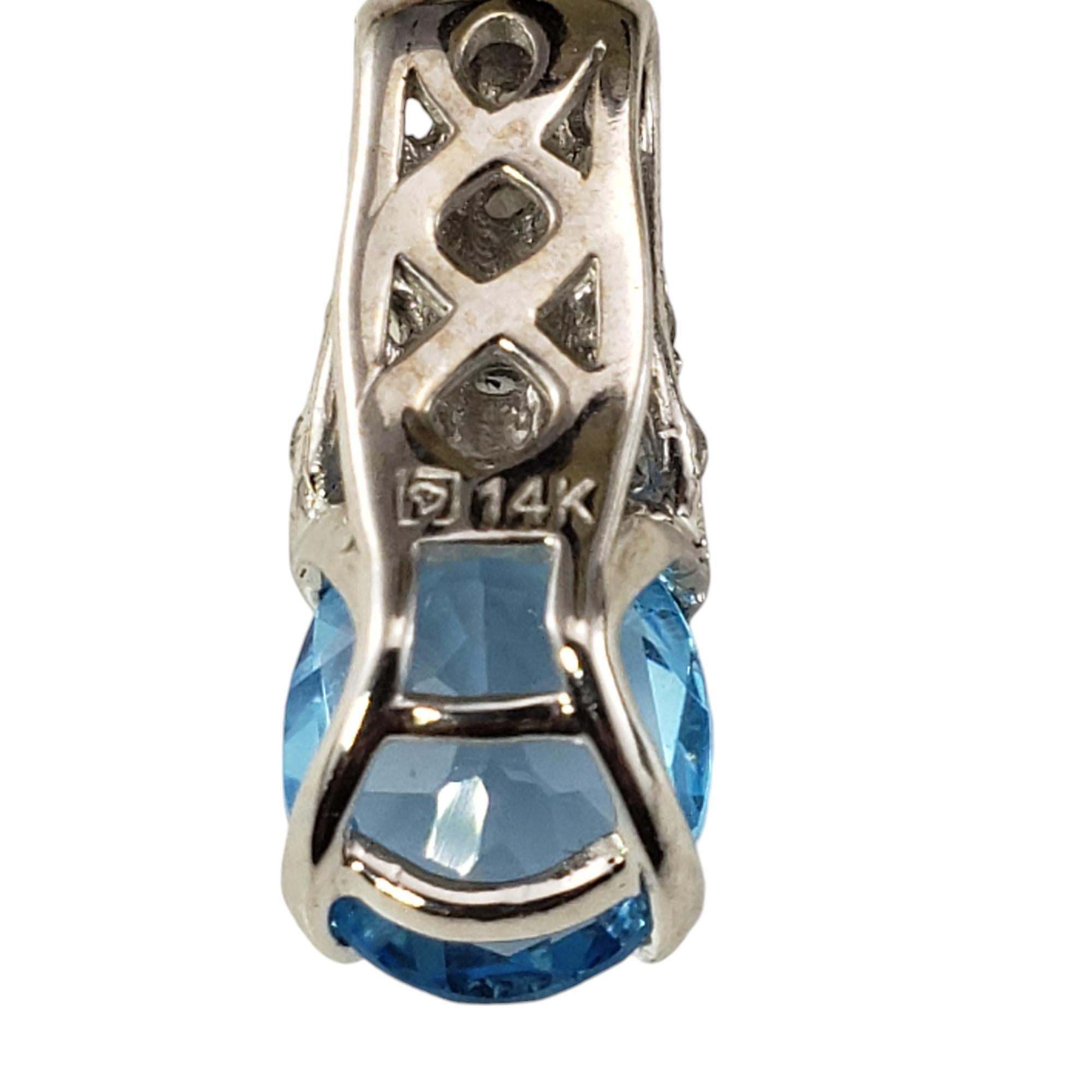 Donna Ciondolo in oro bianco 14 carati con topazio blu e diamanti #18636 in vendita