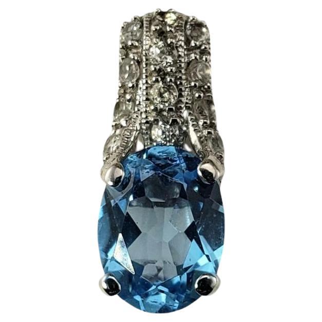 14 Karat White Gold Blue Topaz and Diamond Pendant #18636