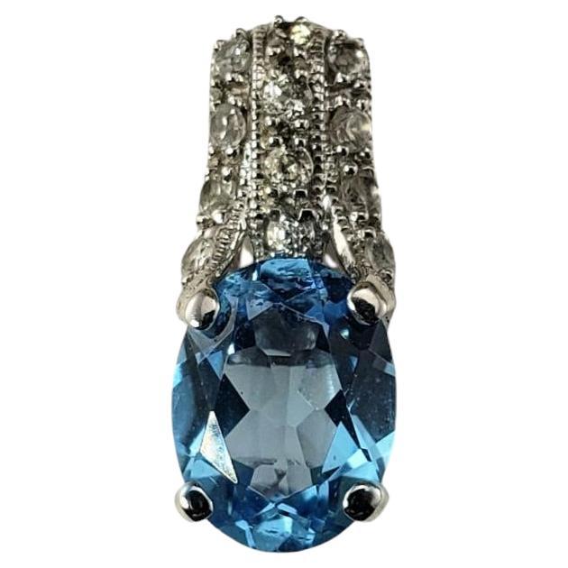 14 Karat White Gold Blue Topaz and Diamond Pendant #18636