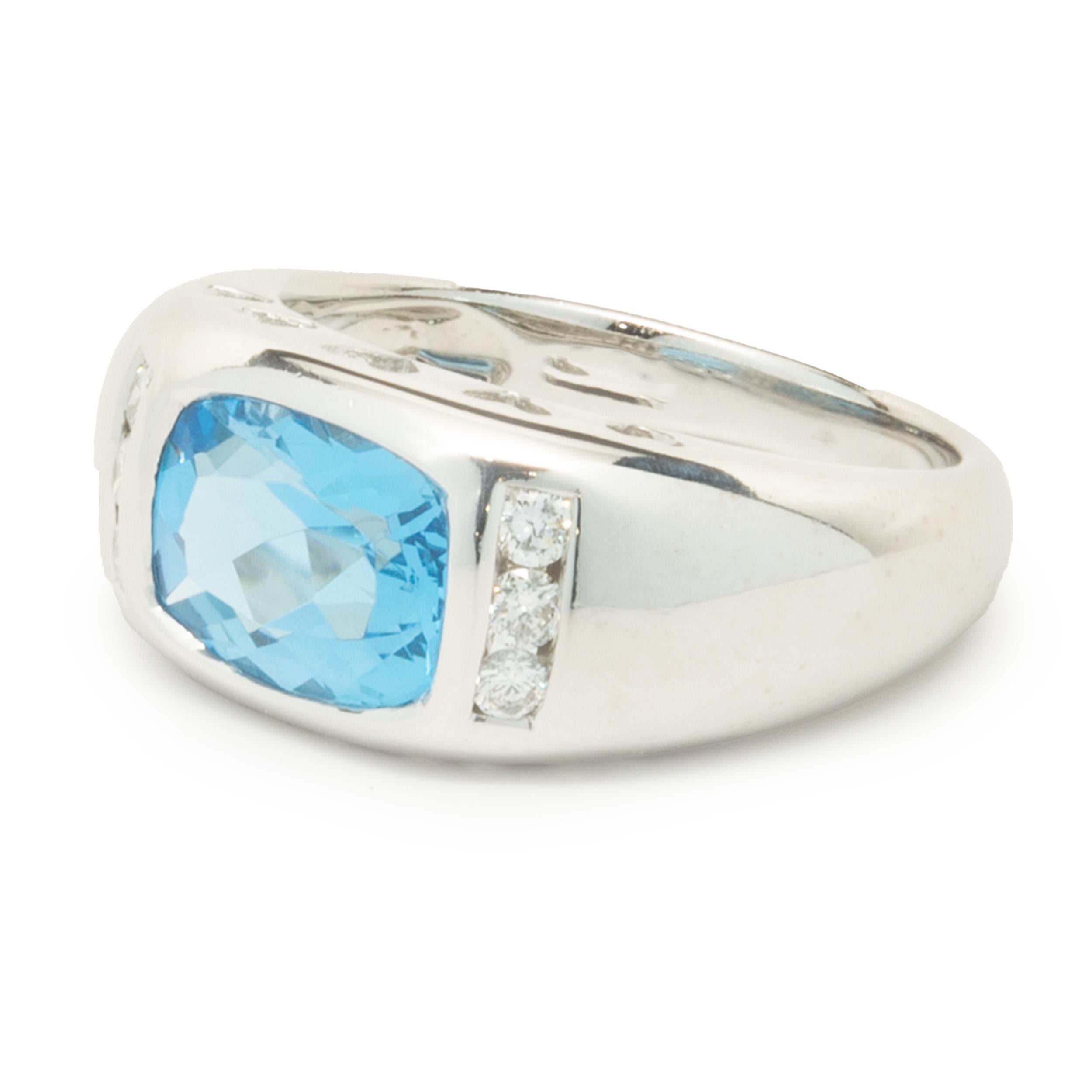 Round Cut 14 Karat White Gold Blue Topaz and Diamond Ring For Sale