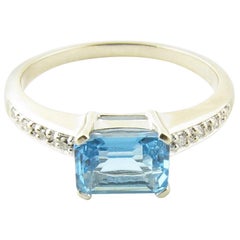 14 Karat White Gold Blue Topaz and Diamond Ring