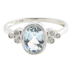 14 Karat White Gold Blue Topaz and Diamond Ring