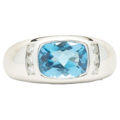 14 Karat White Gold Blue Topaz and Diamond Ring