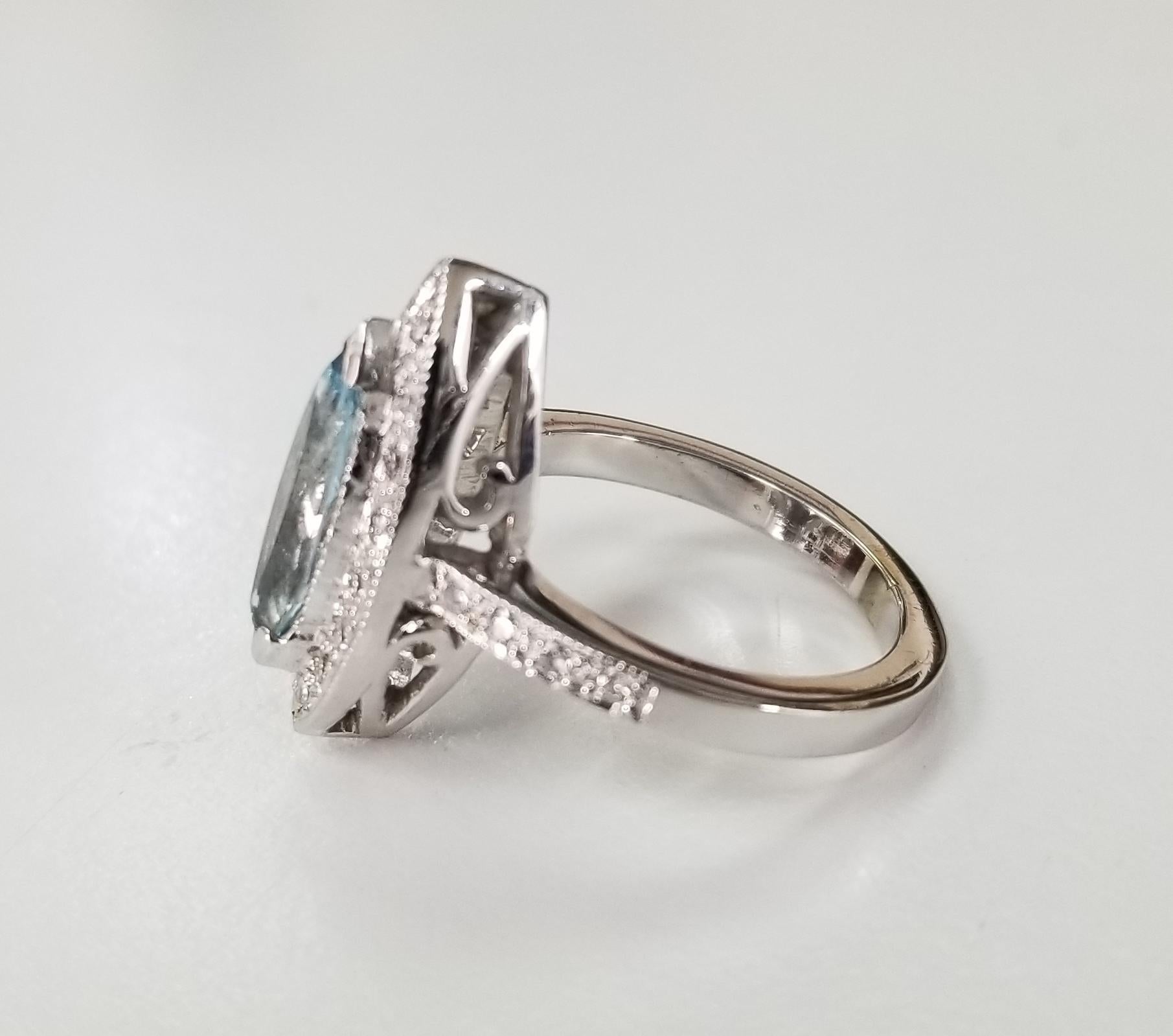 14 Karat Weißgold Ring mit blauem Topas im Marquise-Schliff und Diamanten (Kunsthandwerker*in) im Angebot