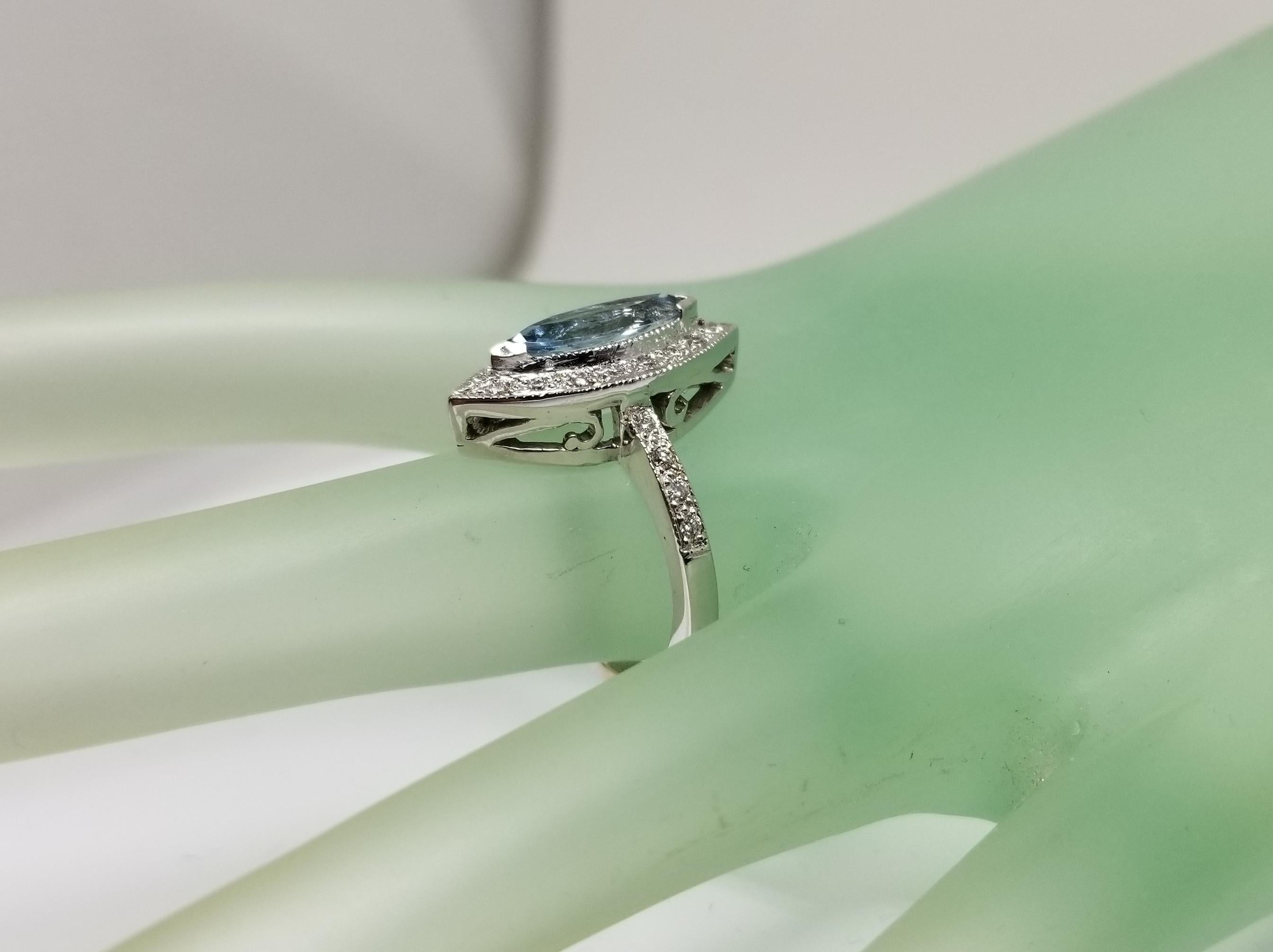 14 Karat White Gold Blue Topaz Marquise Cut and Diamond Ring For Sale 2