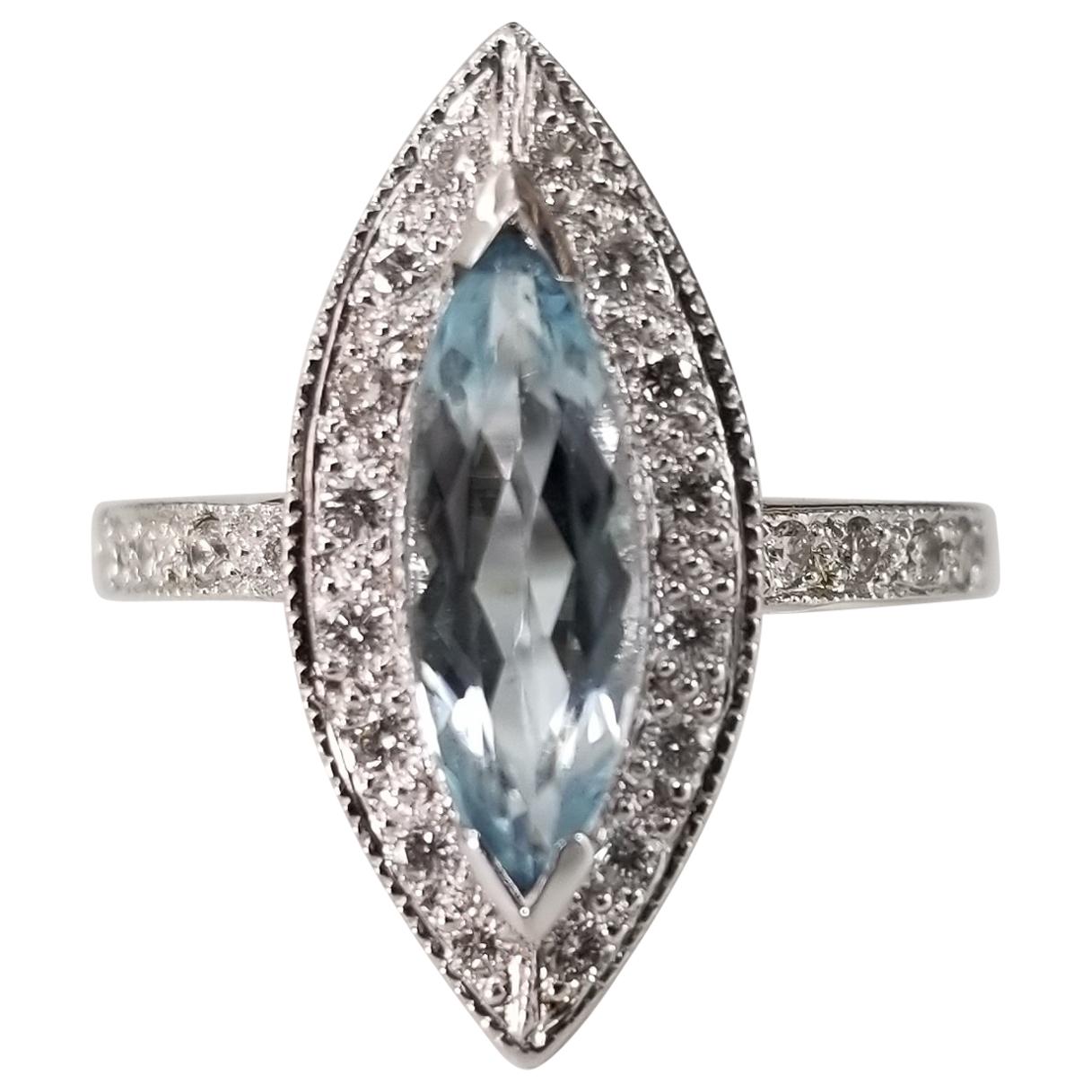 14 Karat White Gold Blue Topaz Marquise Cut and Diamond Ring For Sale