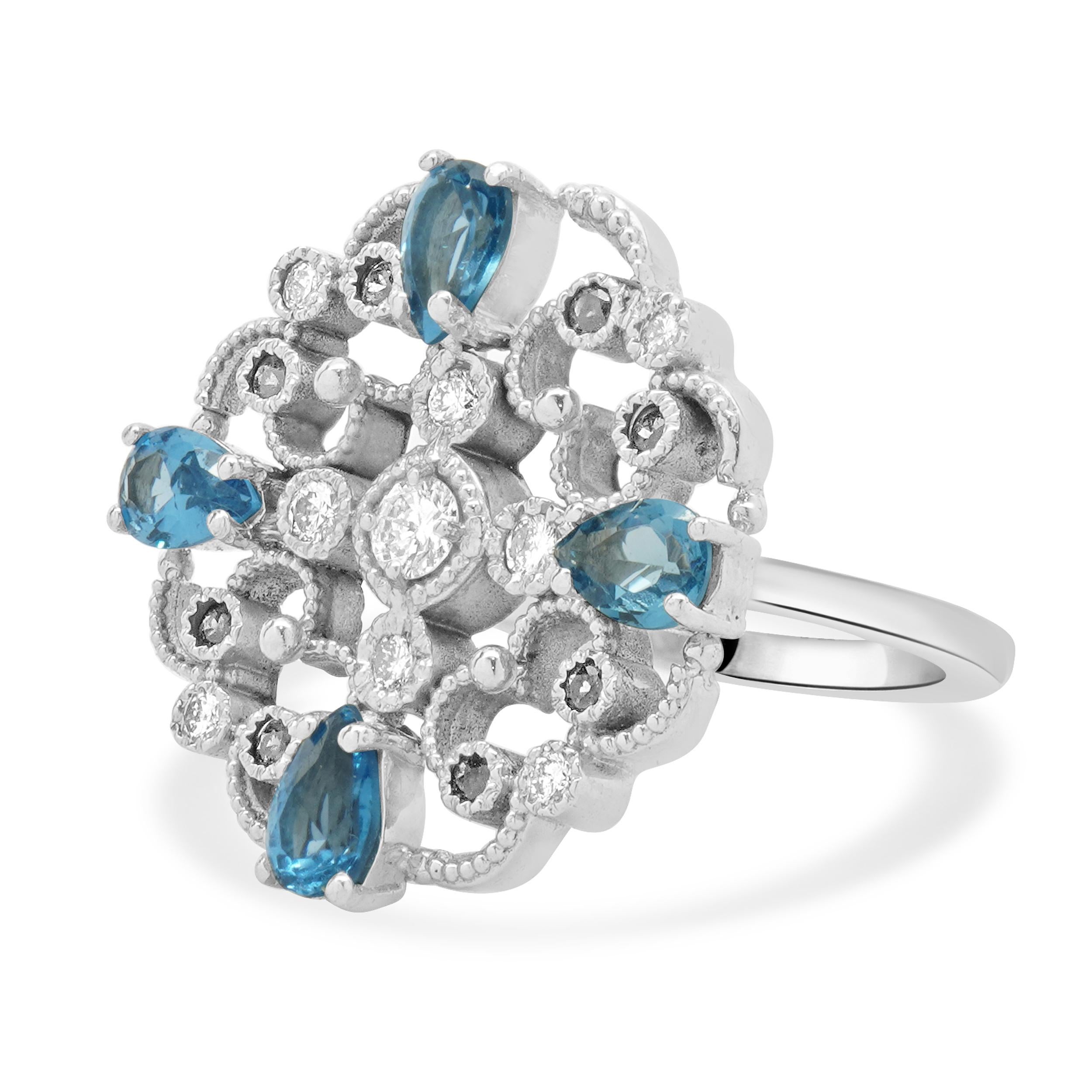 Designer: custom
Material: 14K white gold
Diamond: 9 round brilliant cut = 0.30cttw
Color: G
Clarity: SI1
Blue Topaz: 4 pear cut = 1.80cttw
Sapphires: 8 round cut= 0.16cttw
Dimension: ring top measures 24mm wide
Ring Size: 8.25 (please allow two