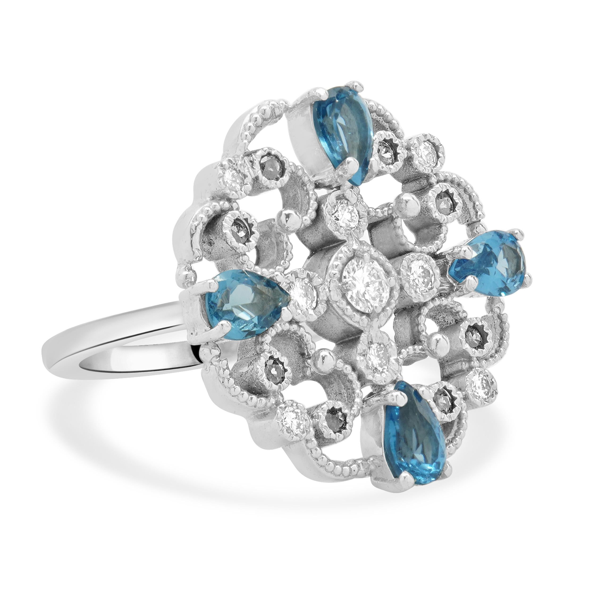 14 Karat White Gold Blue Topaz, Sapphire, and Diamond Flower Ring In Excellent Condition For Sale In Scottsdale, AZ
