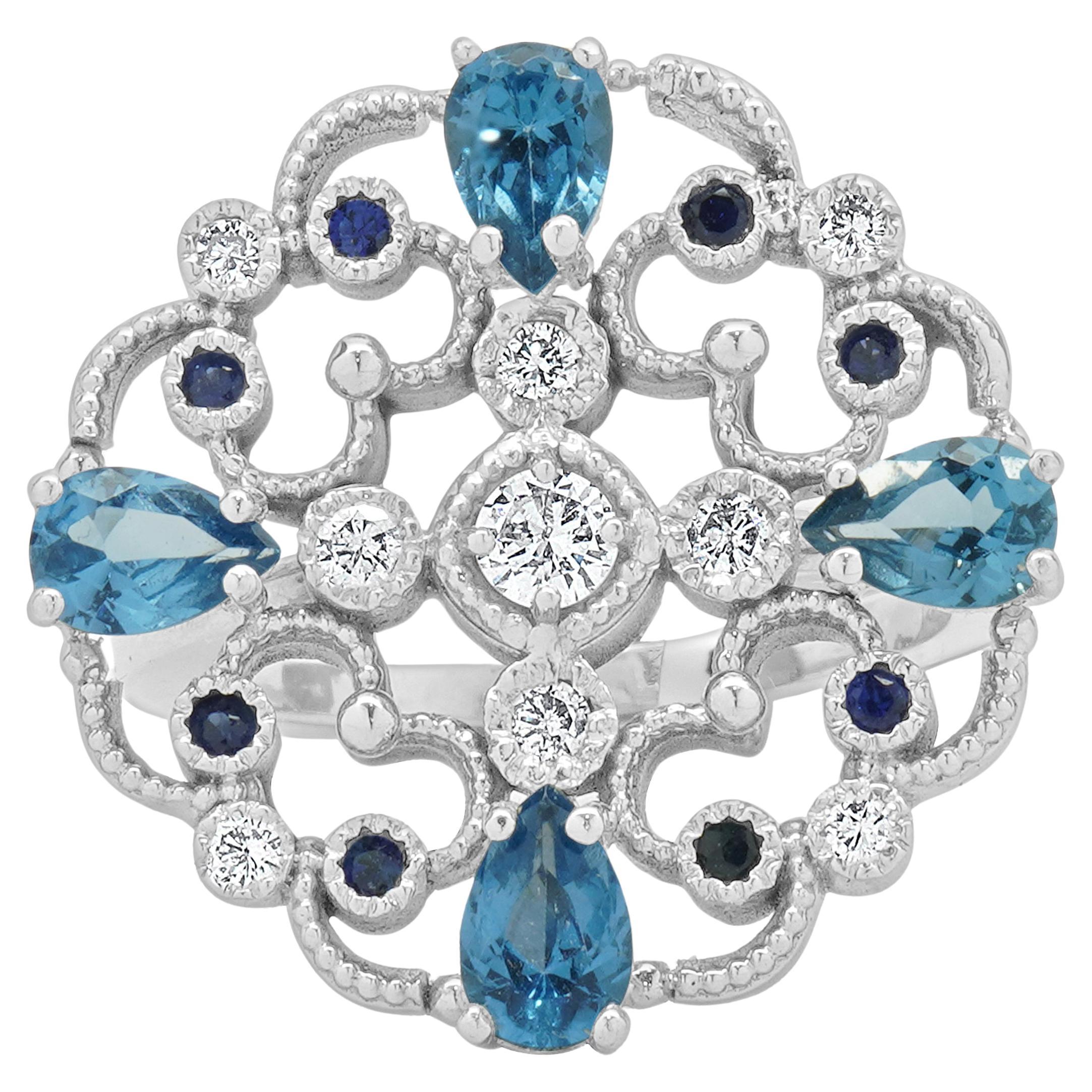 14 Karat White Gold Blue Topaz, Sapphire, and Diamond Flower Ring For Sale