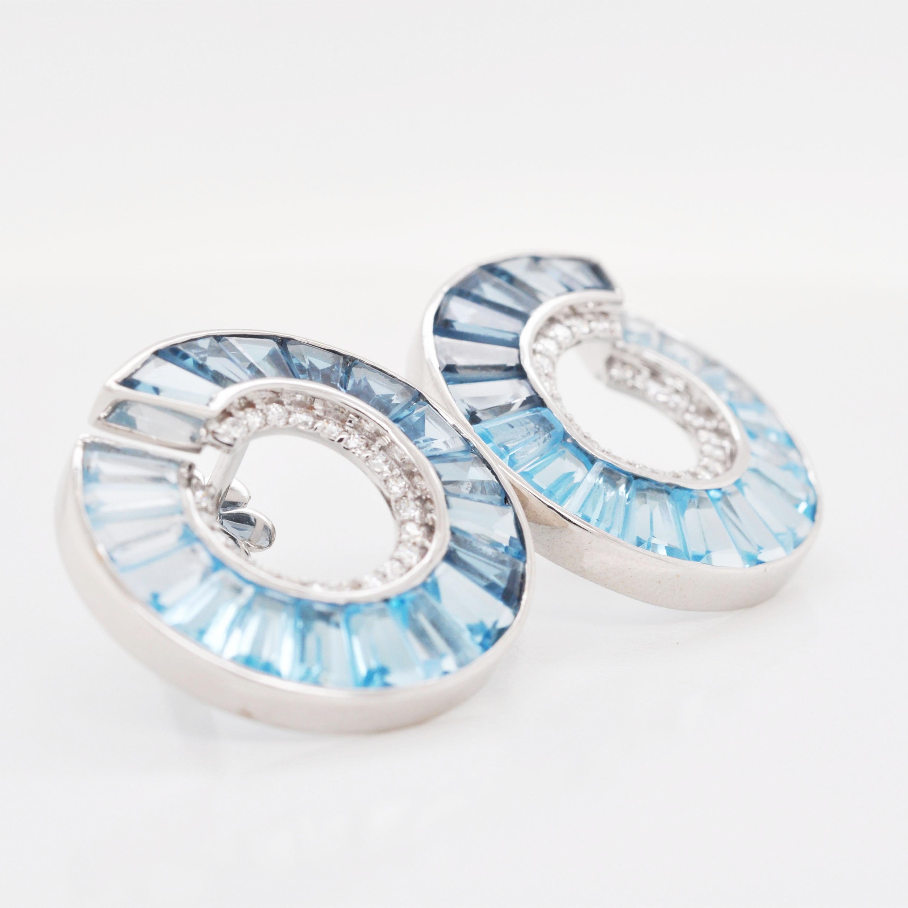 Baguette Cut 14 Karat White Gold Blue Topaz Taper Baguette Diamond Curve Stud Earrings For Sale