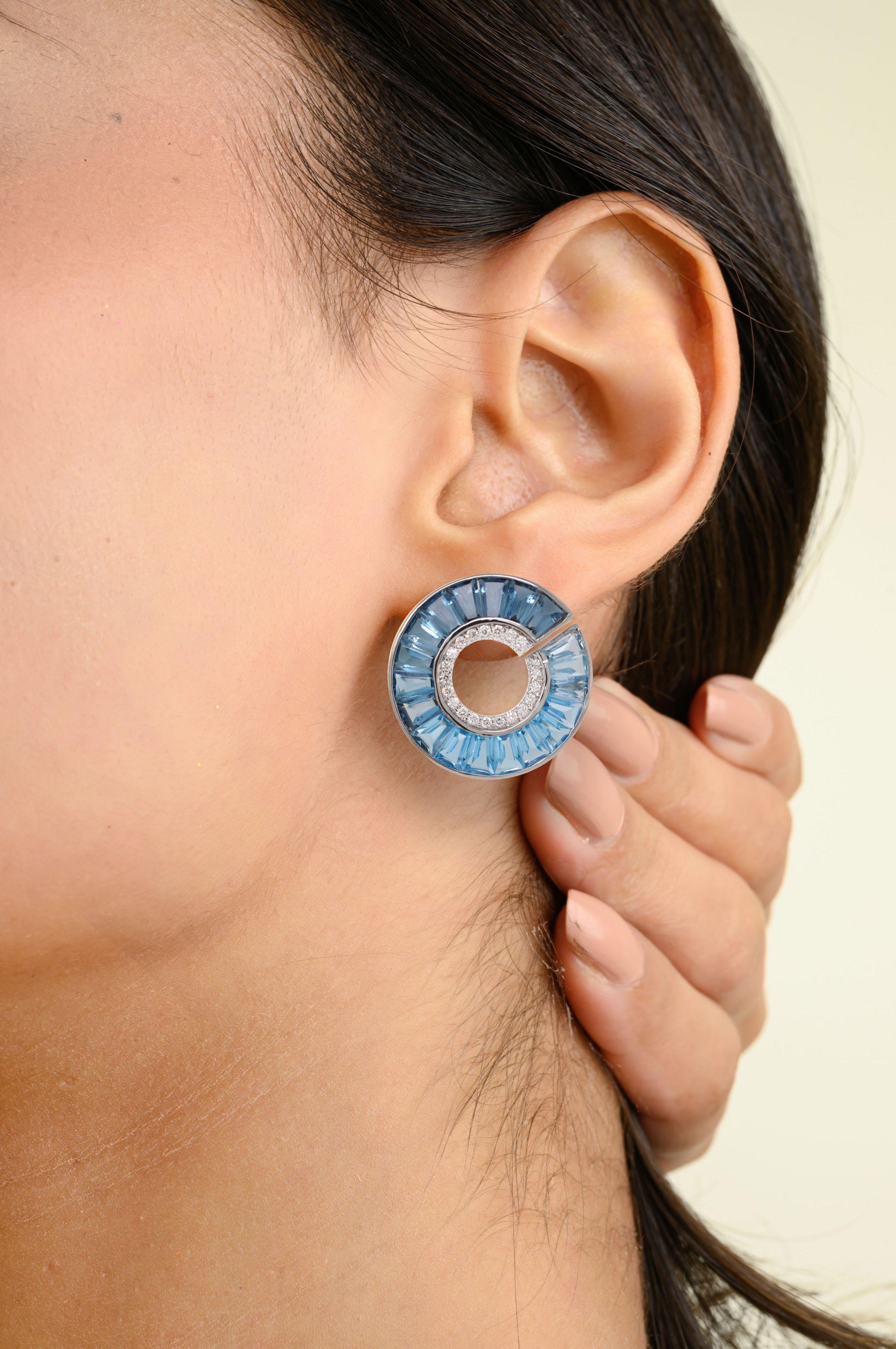 Women's 14 Karat White Gold Blue Topaz Taper Baguette Diamond Curve Stud Earrings For Sale