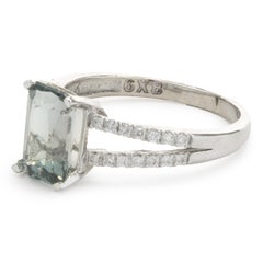 Bague en or blanc 14 carats avec tourmaline bleue et diamants