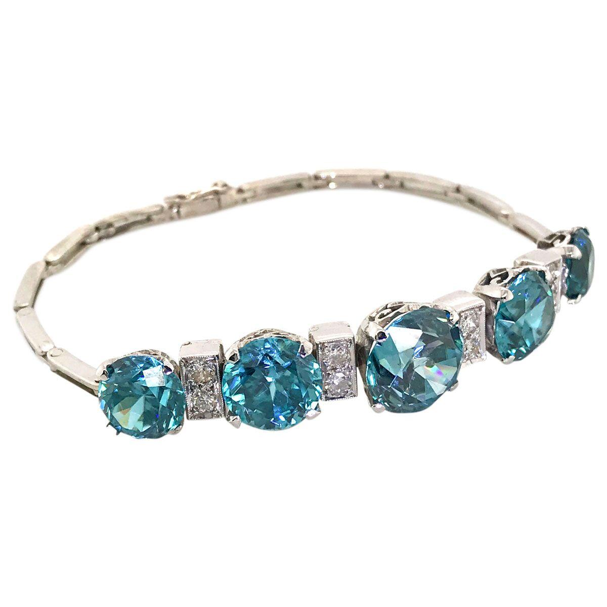 Do you love blue zircons? If the answer to that is a resounding YES, then you need to look closely at this bracelet. Fashioned in 14 karat white gold, it has the most amazing blue zircons you will ever see. It's hard to find one brilliant blue