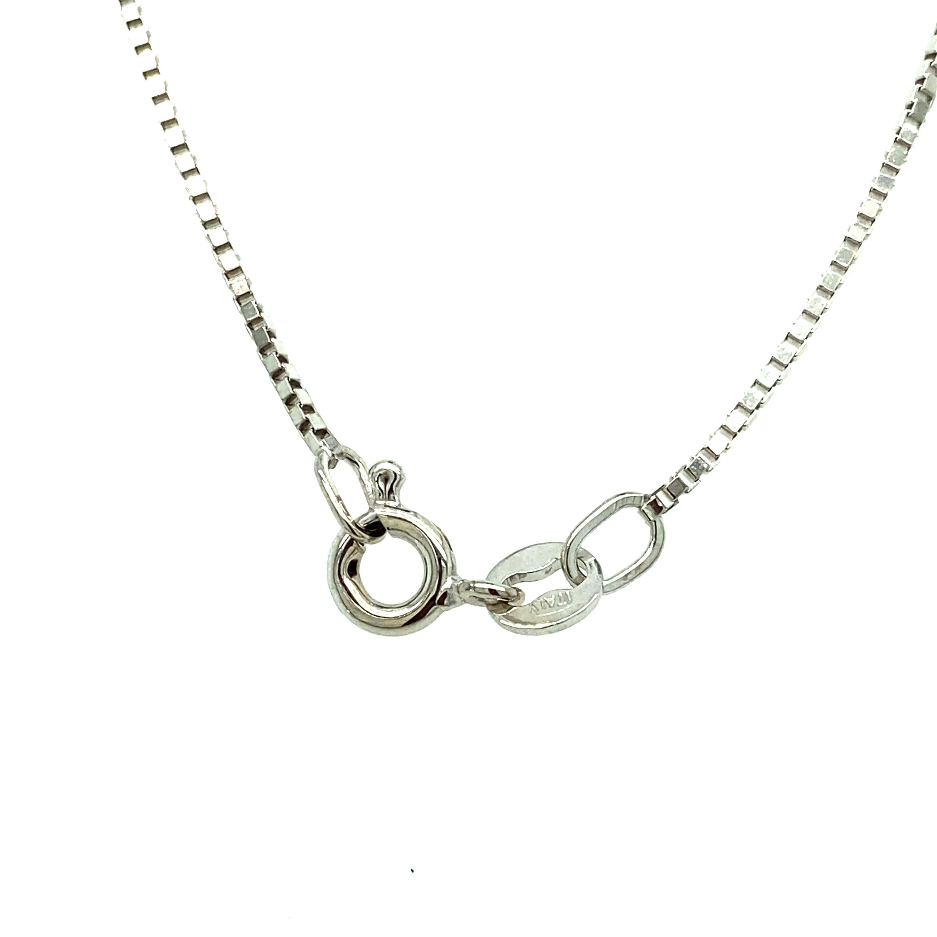 14 karat white gold box chain measuring 15 inches long with a spring ring clasp.  
