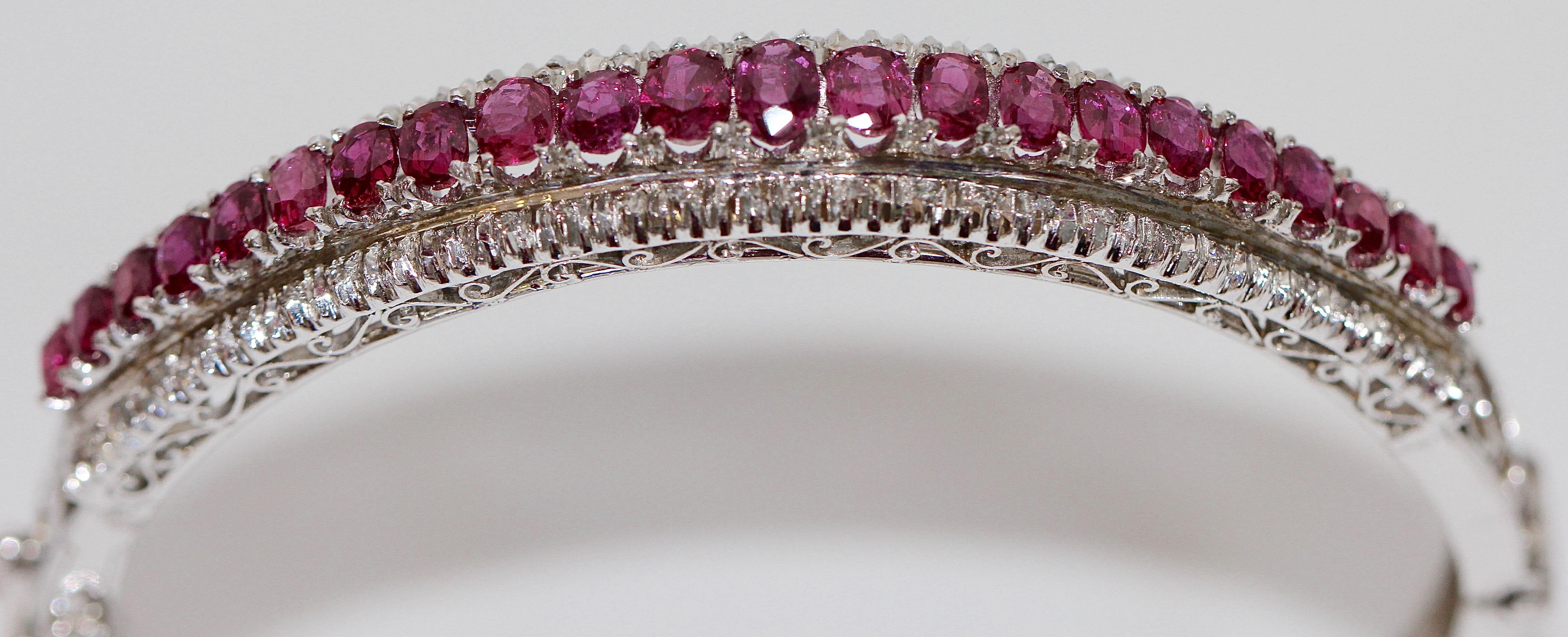 Pretty white gold bracelet set with lots of rubies and tiny diamonds.