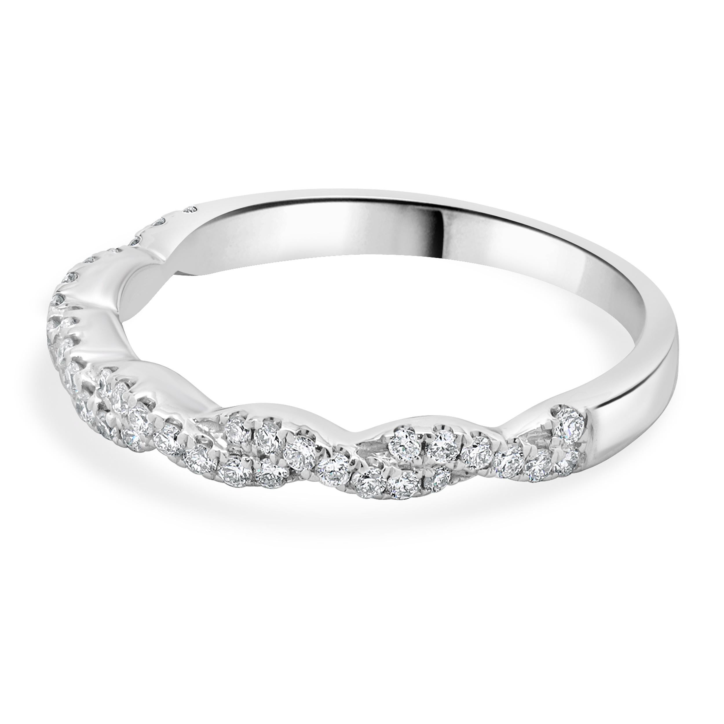 Designer: custom
Material: 14K white gold
Diamond: 21 round brilliant cut = 0.21cttw
Color: H
Clarity: SI2
Ring size: 6.5 (please allow two additional shipping days for sizing requests)
Weight: 2.01 grams
