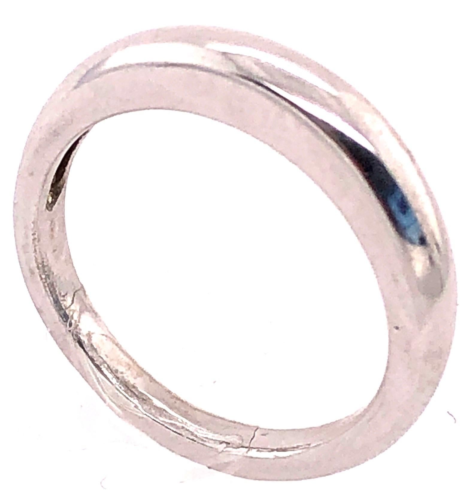 14 Karat White Gold Band/Wedding Ring.
Size 7
4.41 grams total weight.