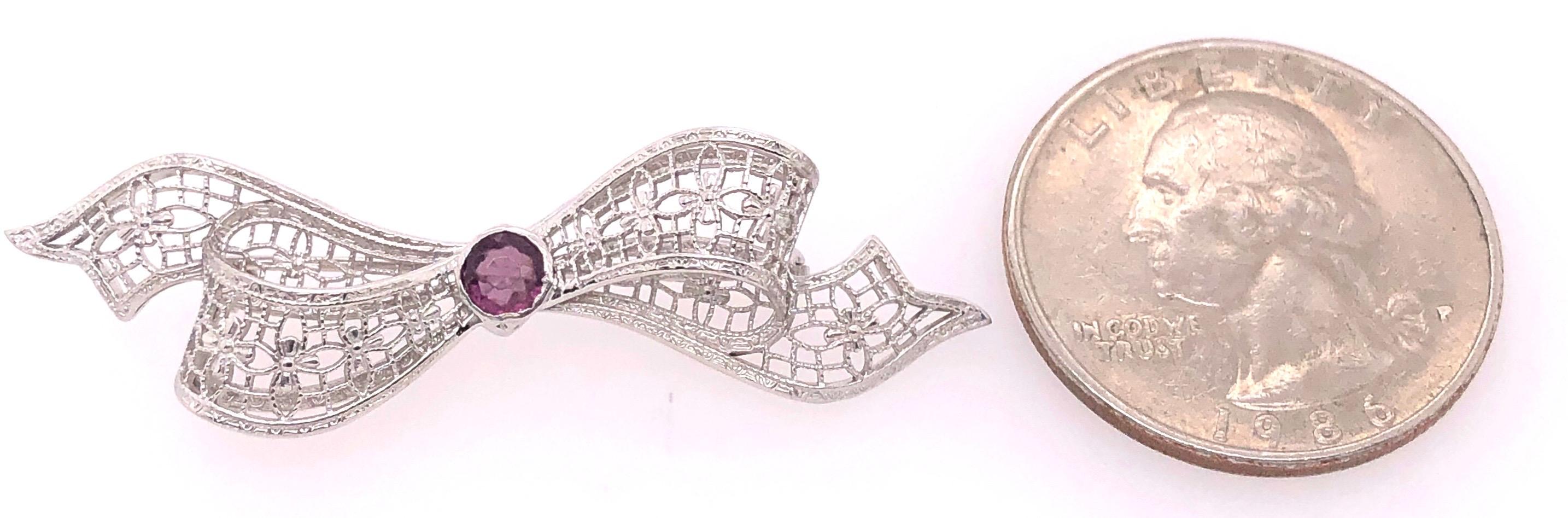 Round Cut 14 Karat White Gold Brooch Filigree Bow Design with Amethyst Center Stone Pin For Sale