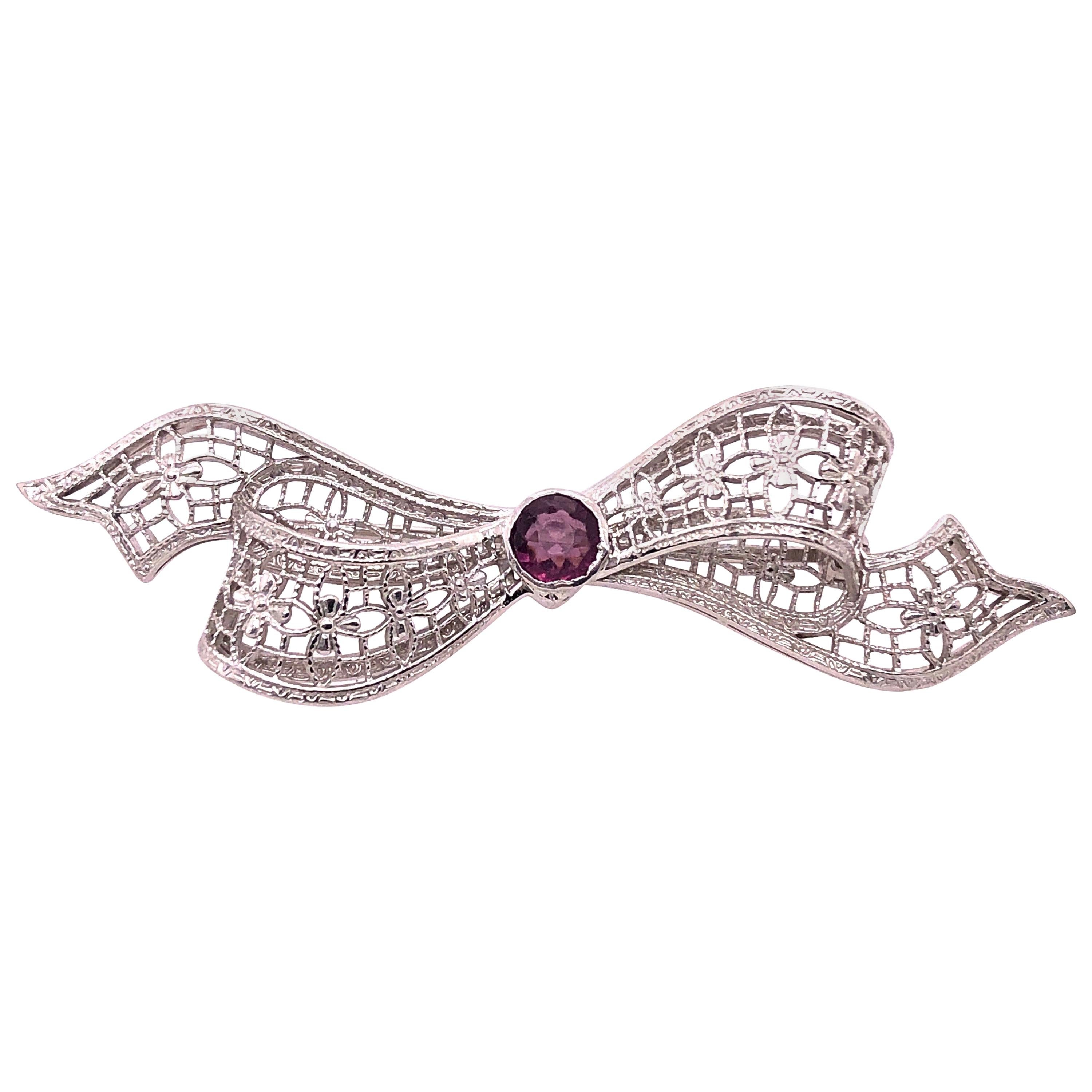 14 Karat White Gold Brooch Filigree Bow Design with Amethyst Center Stone Pin For Sale