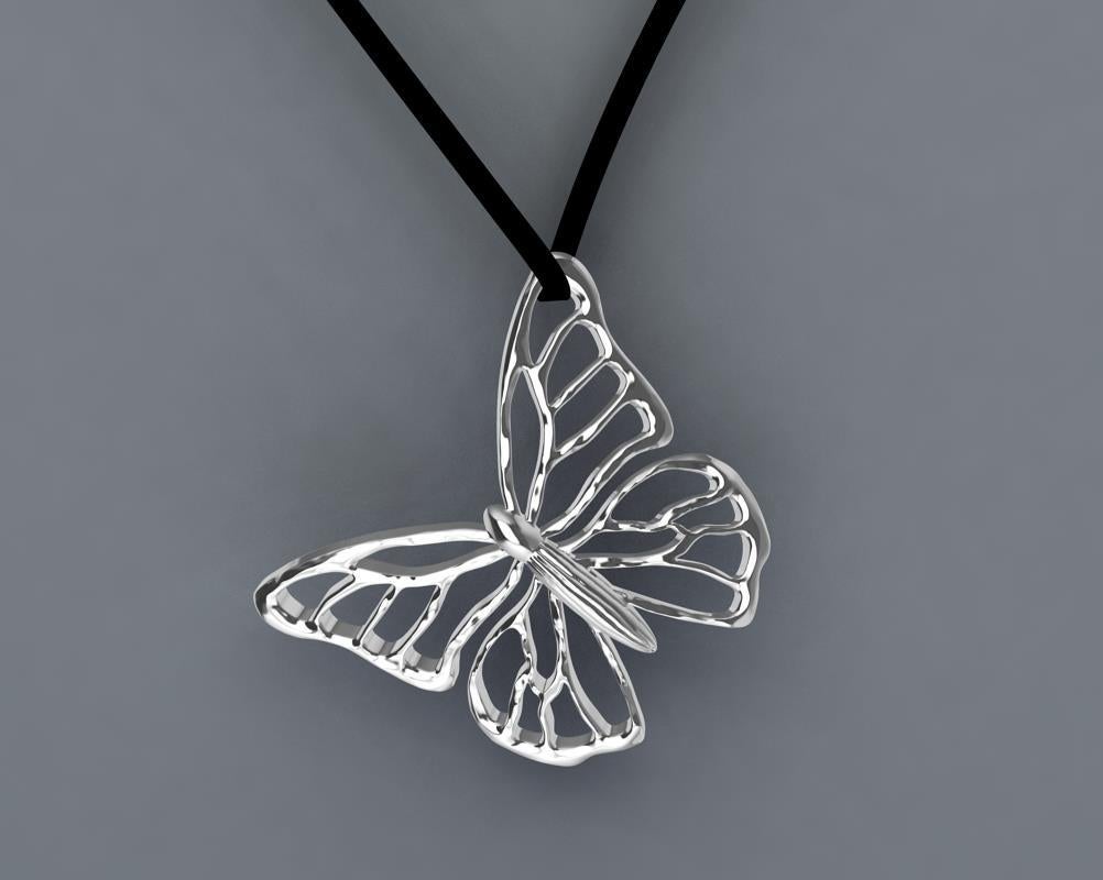 Tiffany designer, Thomas Kurilla created this 14 Karat White Gold Butterfly Necklace on Suede, K.I.S.S. Keep it simple seasonally. ? Hand sculpted.  Keep your winter time thoughts warm with this butterfly pendant. Flat black ultra suede 30 inches so