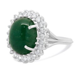 14 Karat White Gold Cabochon Emerald With Diamond Halo Ring