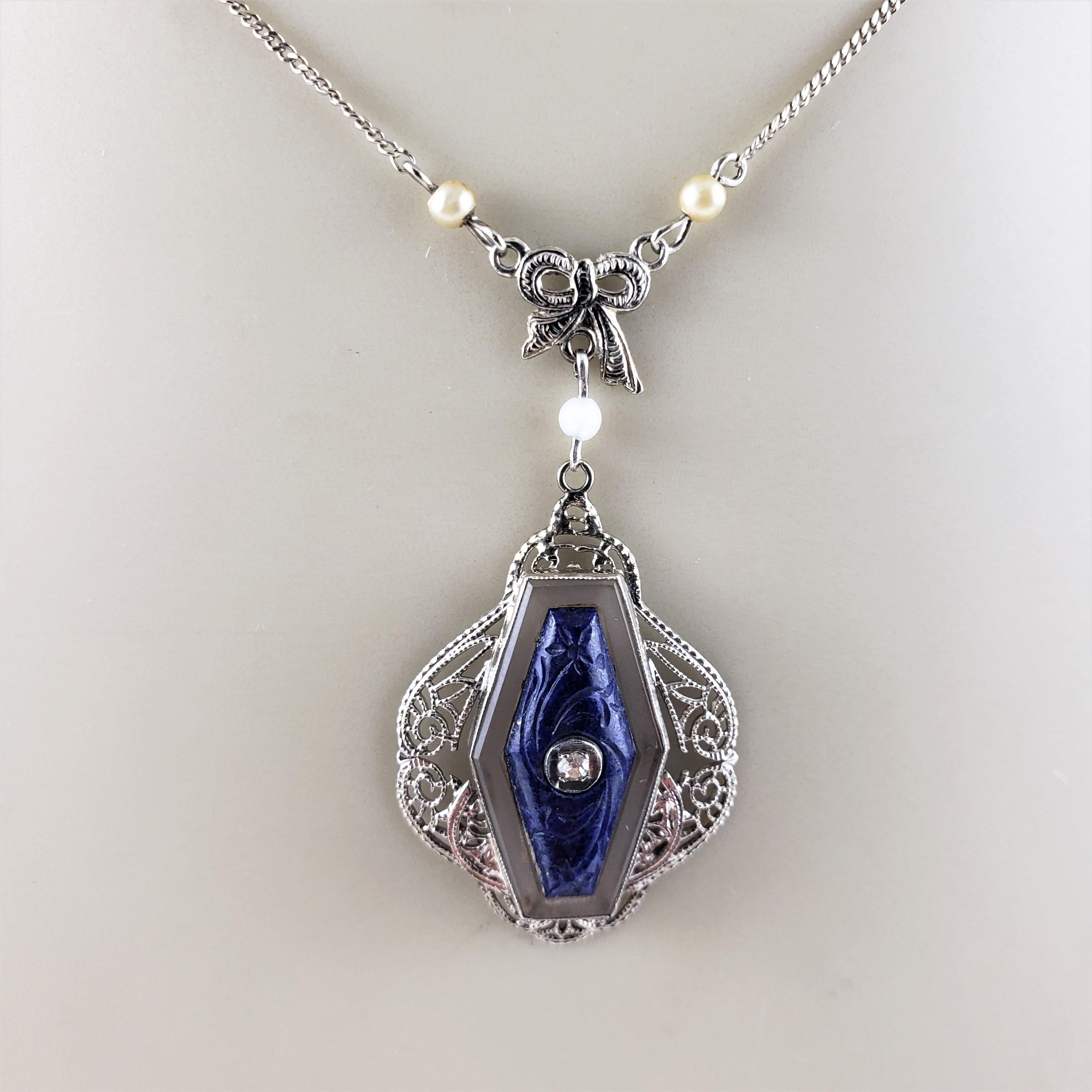 Round Cut 14 Karat White Gold Carved Lapis and Diamond Pendant Necklace For Sale