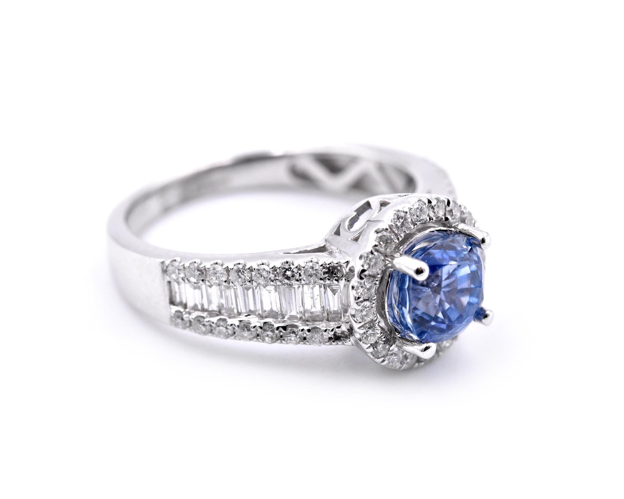 Designer: custom design
Material: 14k white gold
Gemstones: Ceylon Sapphire = 1.57ct
Certification: AGI 25329
Diamonds: 63 round brilliant cuts = .92cttw
Color: F
Clarity: VS2-SI
Ring Size: 7.5 (please allow two additional shipping days for sizing