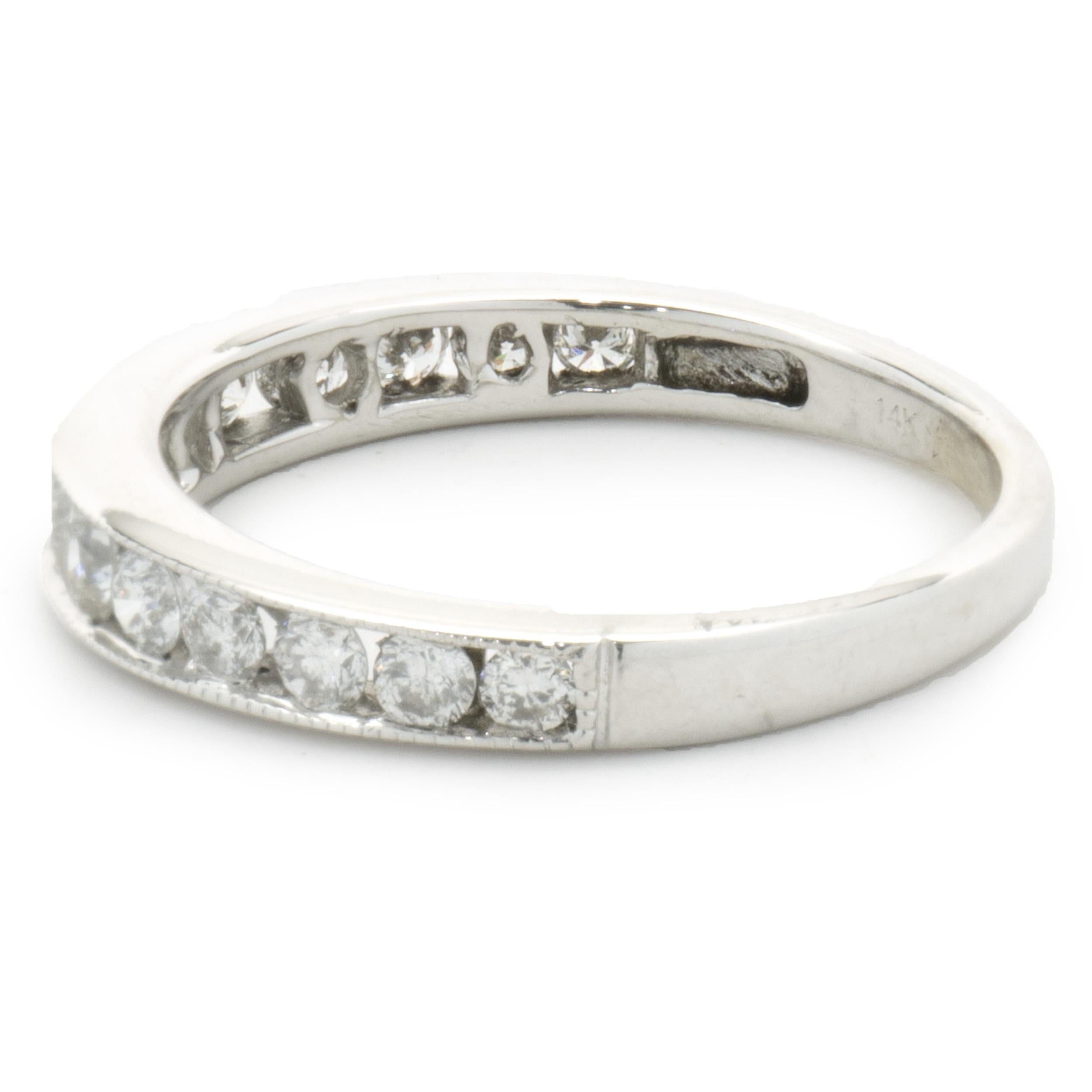 Designer: Custom
Material: 14K white gold
Diamonds: 14 round brilliant cut = 0.70cttw
Color: H
Clarity: SI2
Size: 6.75 sizing available 
Dimensions: ring measures 3.66mm in width
Weight: 2.43 grams