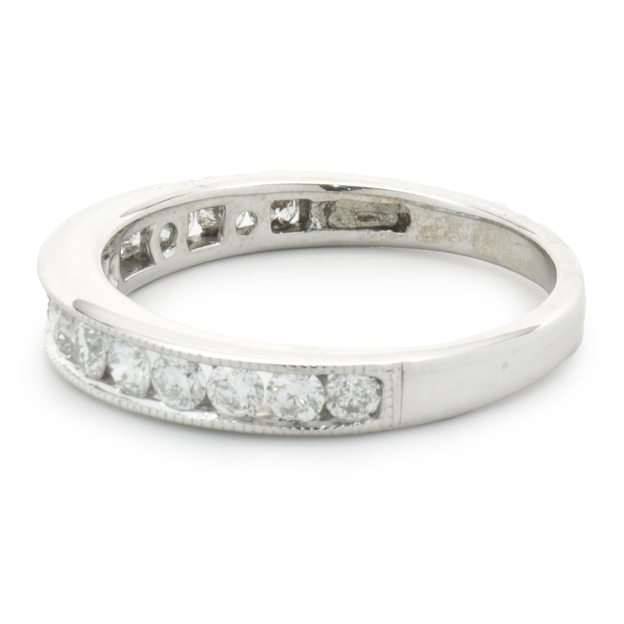 Designer: Custom
Material: 14K white gold
Diamonds: 14 round brilliant cut = 0.70cttw
Color: H
Clarity: SI2
Size: 6.75 sizing available 
Dimensions: ring measures 3.66mm in width
Weight: 2.80 grams