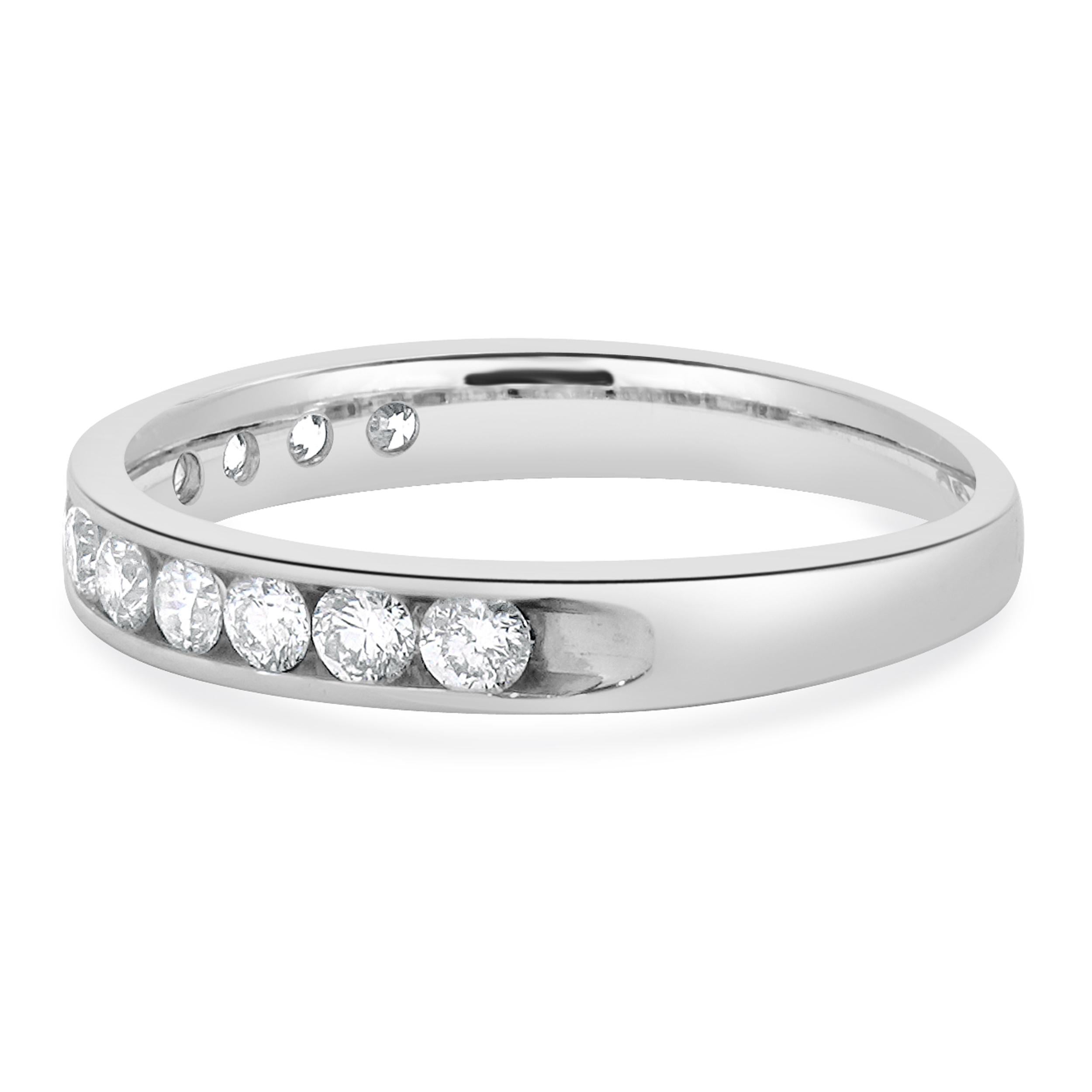 Designer: custom
Material: 14K white gold
Diamond: 12 round brilliant cut = 0.60cttw
Color: H/I
Clarity: SI2
Ring size: 6.5 (please allow two additional shipping days for sizing requests)
Weight: 2.20 grams