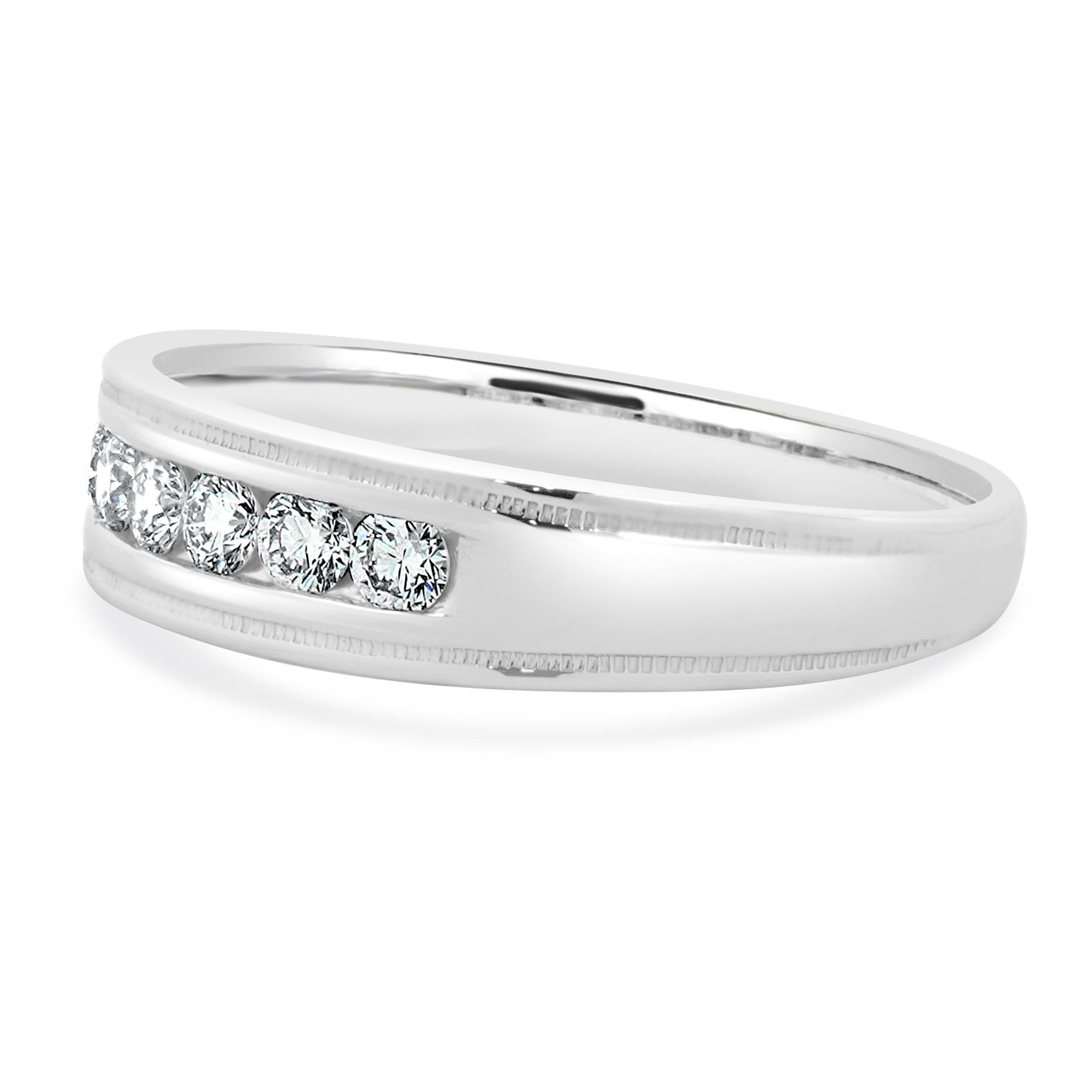 Designer: custom
Material: 14K white gold
Diamond: 7 round brilliant cut = 0.42cttw
Color: G
Clarity: SI1
Ring size: 9.75 (please allow two additional shipping days for sizing requests)
Weight: 4.37 grams

115-86